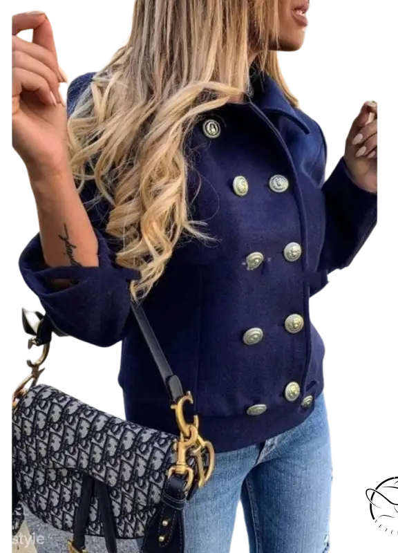 Navy blue double breasted jacket with metallic buttons and loose fit