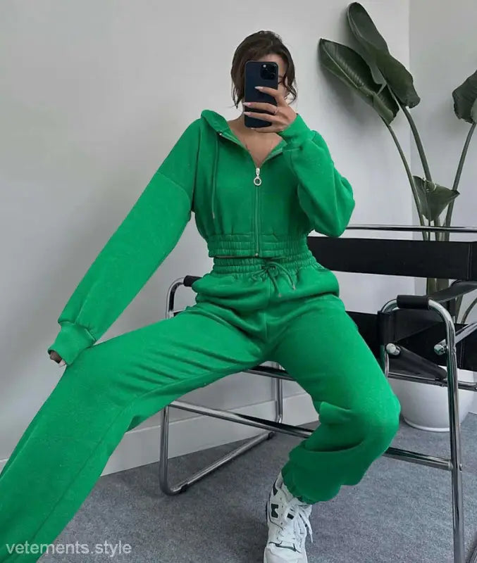 Bright green casual exercise suit with hooded zipper for spring and fall wear, mirror selfie