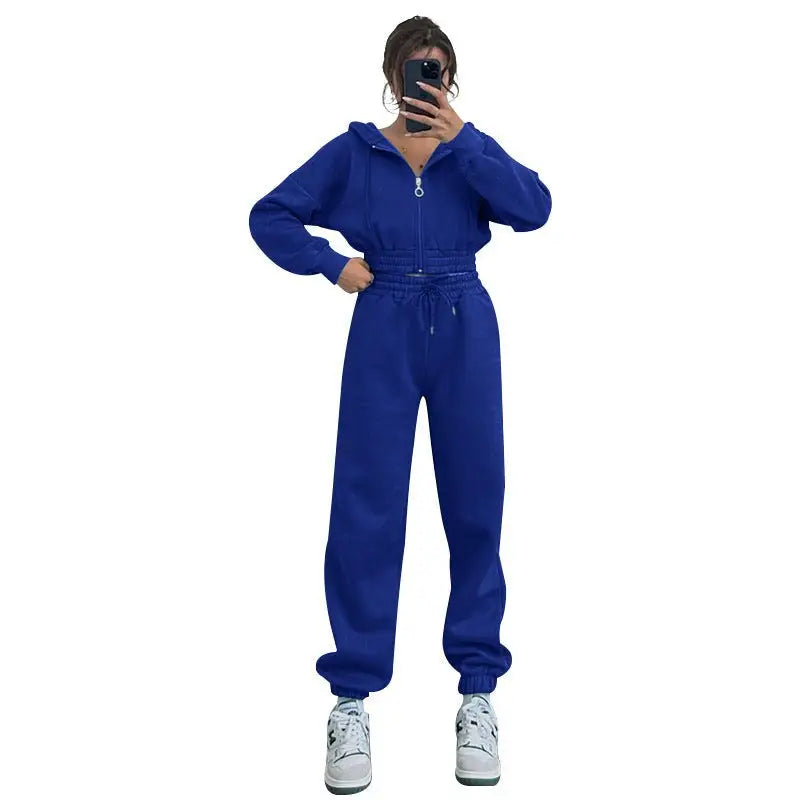 Bright blue casual exercise suit with hooded zipper and matching pants with hooded zipper waist