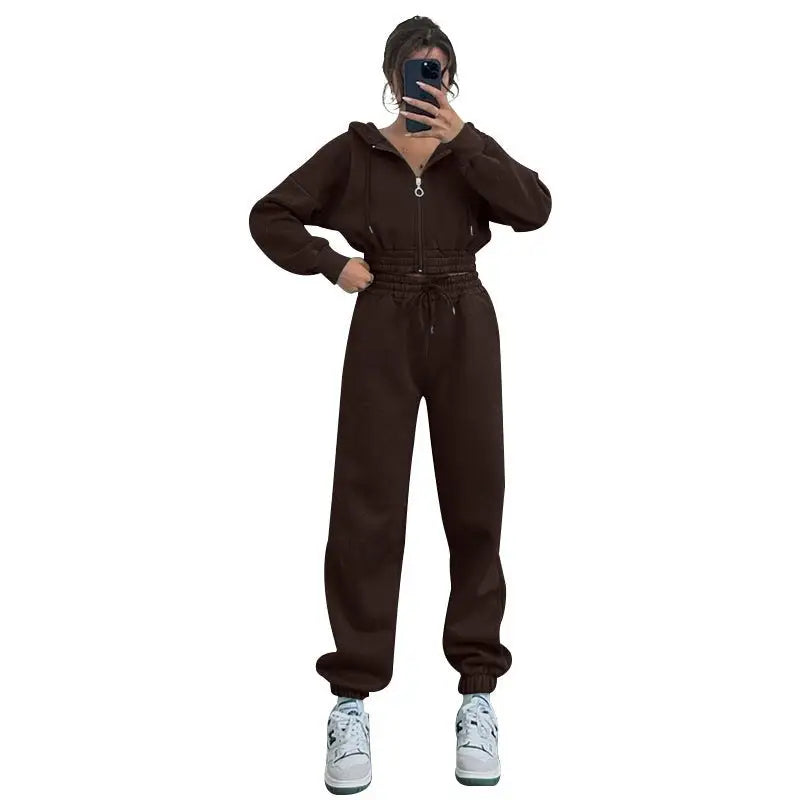 Brown casual exercise suit with hooded zipper and waist, paired with white sneakers