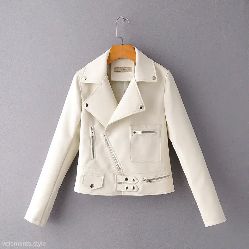 White faux leather biker jacket with silver zippers and belt for stylish fall/winter wear