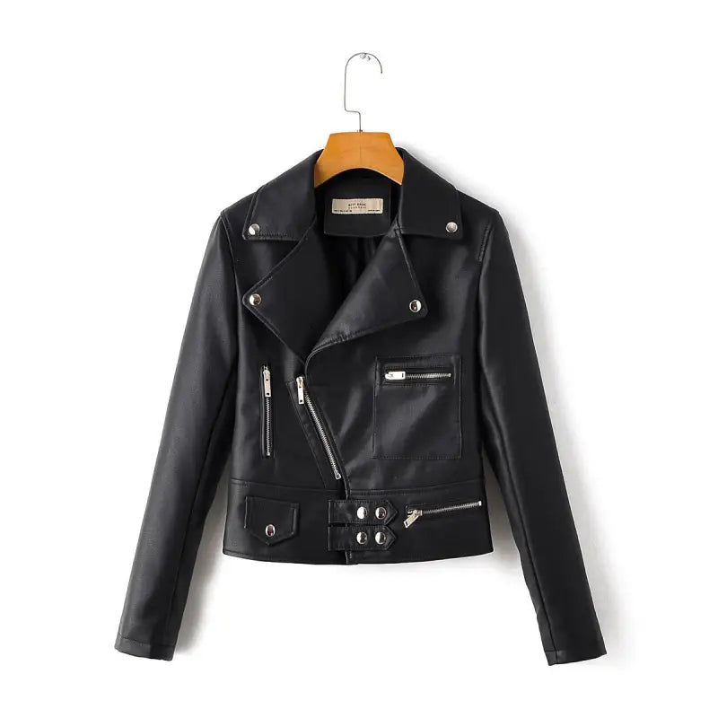 Black washed faux leather biker jacket hanging on a wooden hanger for fall and winter wear