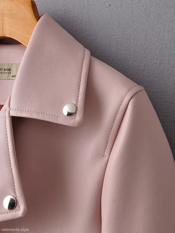 Pale pink washed faux leather biker jacket with silver snap buttons for fall winter wear