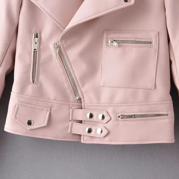 Pale pink washed faux leather biker jacket with zippers and pockets for fall winter wear