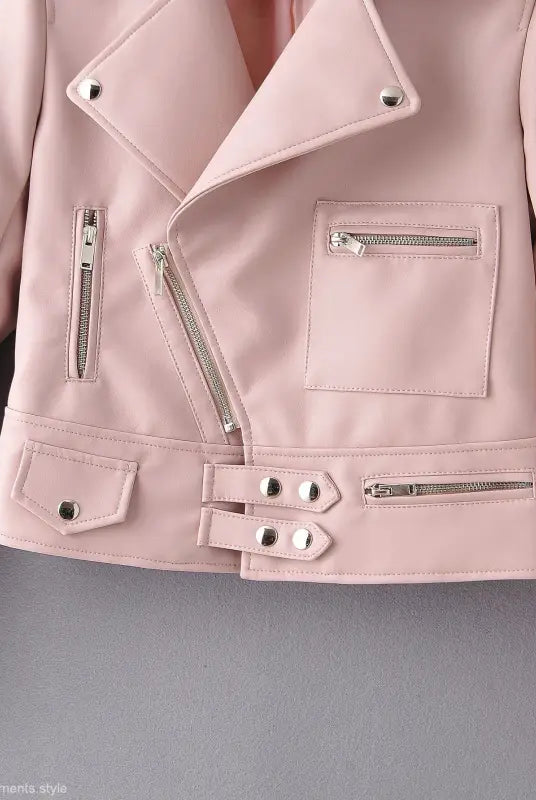 Pale pink washed faux leather biker jacket with zippers and pockets for fall winter wear