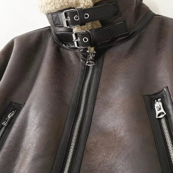 Brown faux shearling jacket with shearling collar, black buckle straps, from Jacket Locomotive