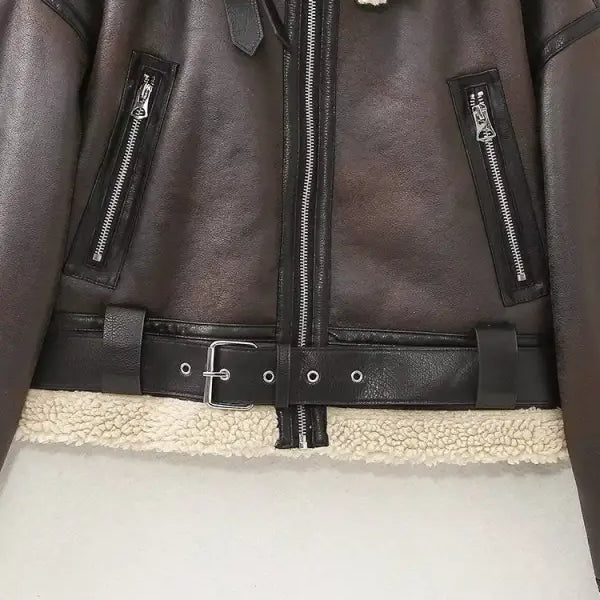 Brown faux shearling jacket with white shearling collar and multiple zippers for casual style