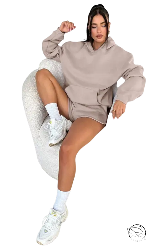 Cozy beige casual fit long sleeved hooded sweater with pockets