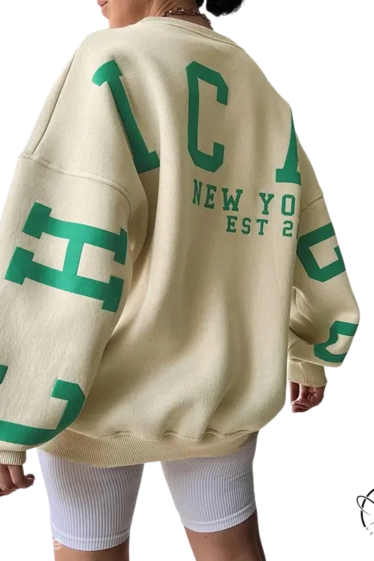Oversized cream knitted graphic printed hoodie with green lettering