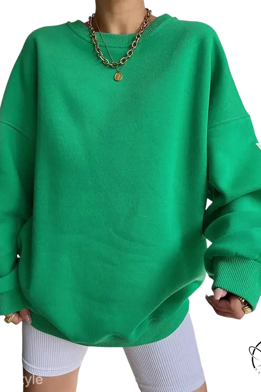 Oversized knitted graphic printed hoodie with gold necklaces