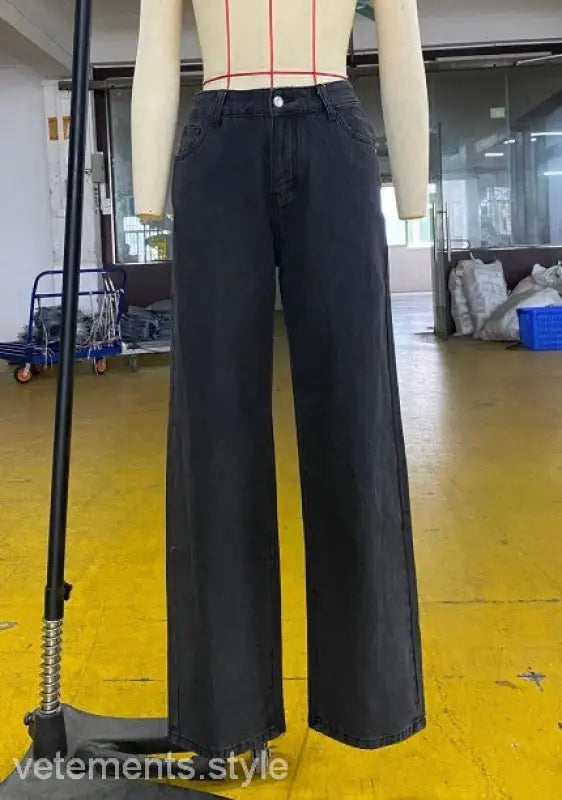 Black wide-leg denim jeans on a mannequin, showcasing casual light blue wide leg jeans with pockets