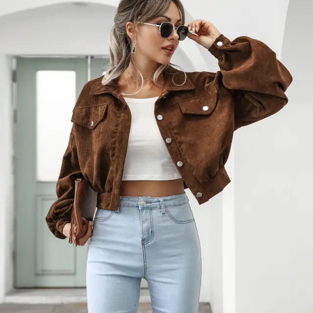 Woman wearing a brown corduroy daily short jacket ideal for Spring and Fall styling