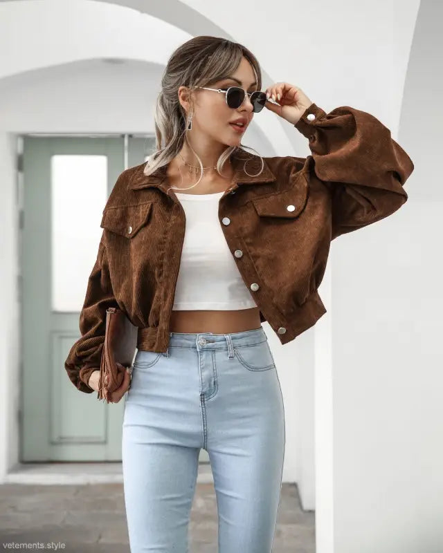 Woman wearing a brown corduroy daily short jacket ideal for Spring and Fall styling