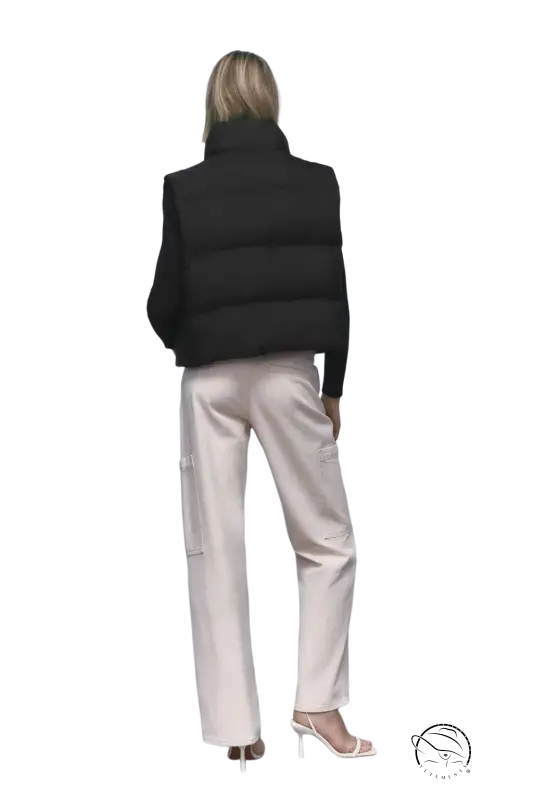 Woman in black puffer vest and pink pants wearing autumn winter short cotton jacket