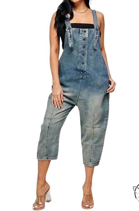 Women’s dirty blue suspender jeans with faded baggy fit and clear high-heeled mules