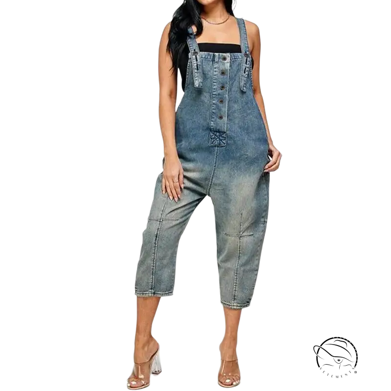 Women’s dirty blue suspender jeans with faded baggy fit and clear high-heeled mules