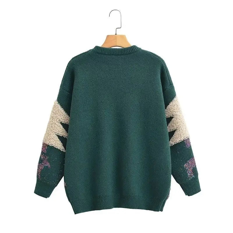 Green knit sweater with beige and purple geometric sleeve patterns, perfect as a deer holiday sweater