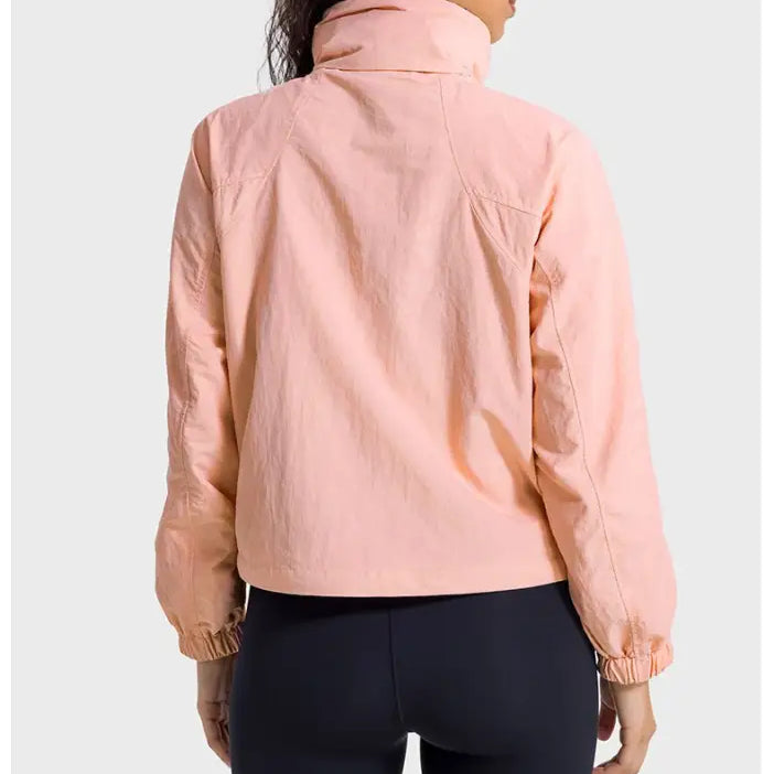 Peach-colored high-collared jacket from Casual Loose Nylon Outerwear in Pearlescent White Albumin