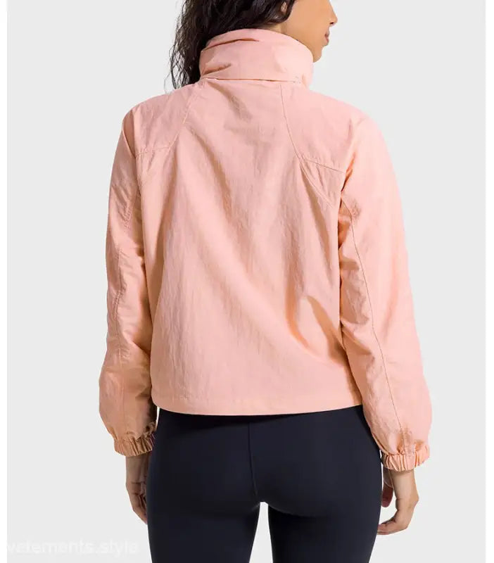 Peach-colored high-collared jacket from Casual Loose Nylon Outerwear in Pearlescent White Albumin