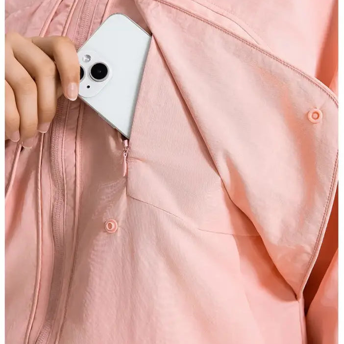 Pink jacket with phone in pocket, part of Casual Loose Nylon Outerwear in Pearlescent White Albumin