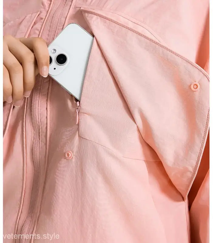 Pink jacket with phone in pocket, part of Casual Loose Nylon Outerwear in Pearlescent White Albumin