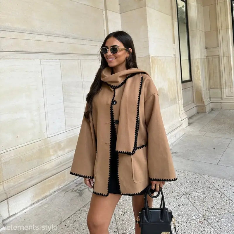 Stylish beige contrast scarf woolen coat worn by woman with sunglasses for Fall/Winter fashion