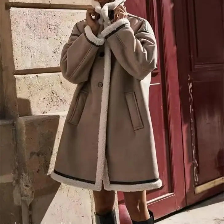 Beige shearling-lined winter fleece jacket with collar closure and pocket details