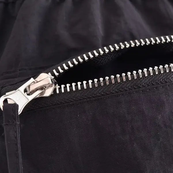 Metal zipper detail on a dark fabric Casual Short Bomber Jacket with Pocket and Tie Stand Collar