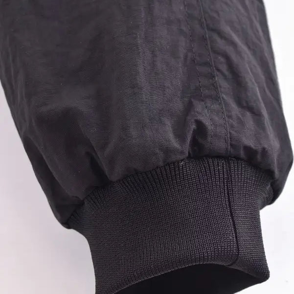 Sleeve cuff of a Casual Short Bomber Jacket featuring a ribbed elastic band