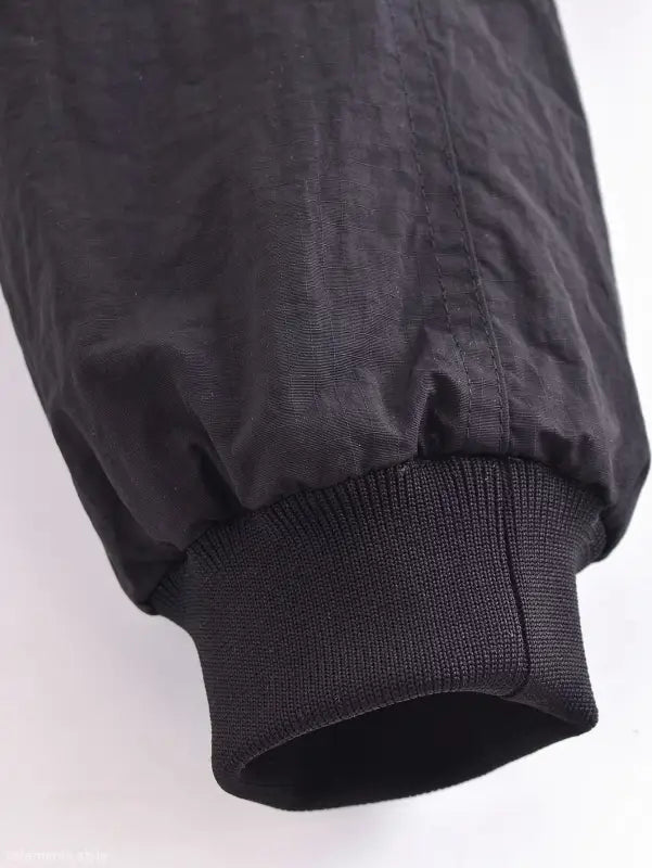 Sleeve cuff of a Casual Short Bomber Jacket featuring a ribbed elastic band