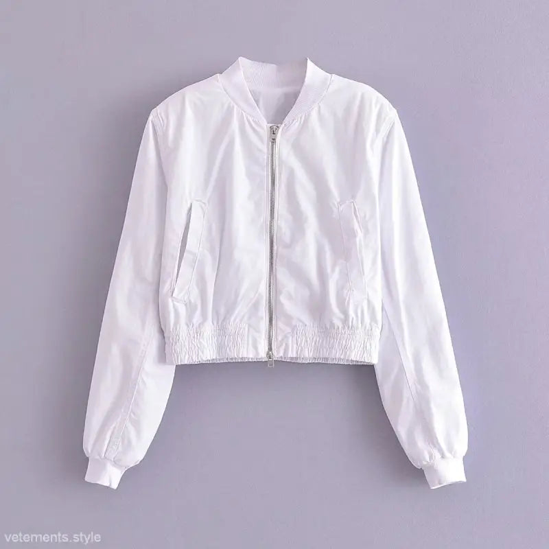 White short bomber jacket with zip, ribbed cuffs, and waistband for casual style
