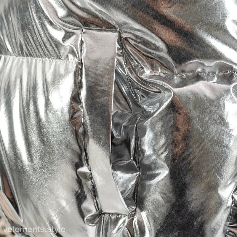 Shiny silver puffer jacket detail of casual silver coat, a stylish winter short coat