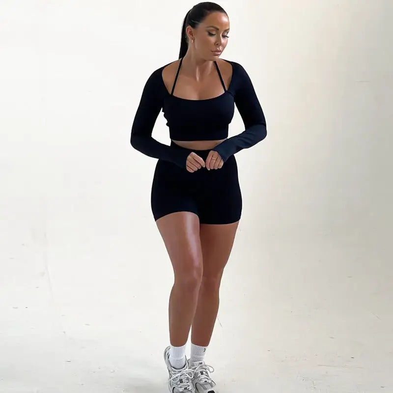 Woman in black knitted thread fitness crop top for spring and fall activities