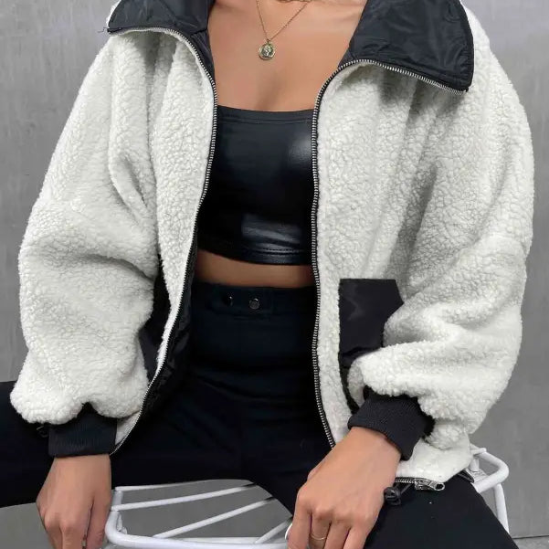 Fluffy white and black urban knitted jacket with contrasting collar for autumn winter comfort