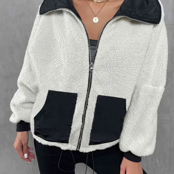 White fleece urban knitted jacket with black trim, pockets, and zipper for autumn winter comfort