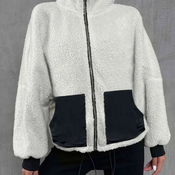 White and black urban knitted jacket with high collar, ideal for autumn winter comfort
