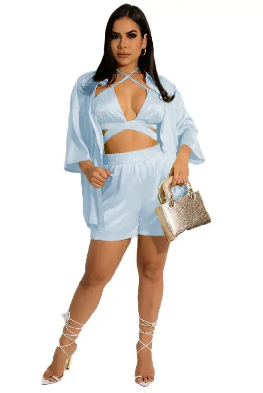 Woman in a cheerful & cute light blue three-piece vest set for women clothing