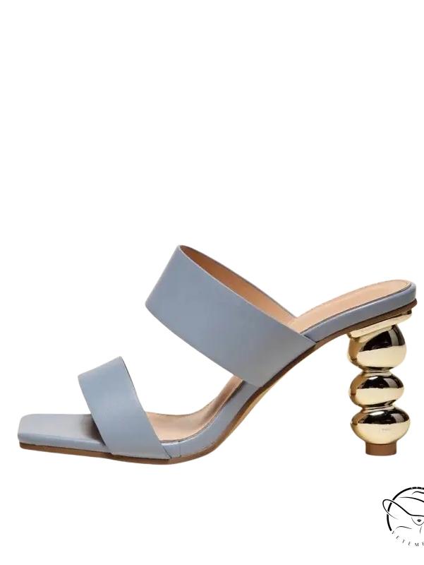 Chic cold drag high heel in light blue leather with gold sphere heel