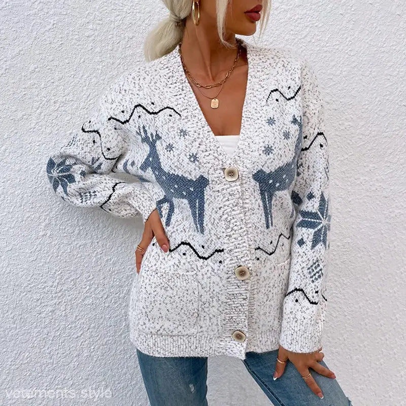 White knit Christmas Deer Cardigan with reindeer and snowflake winter pattern