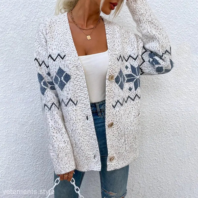 Patterned knit cardigan featuring a pocket in the Christmas Snowflake Sweater design
