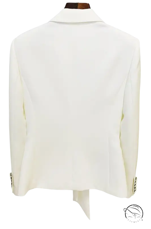 White Clara blazer suit on hanger with zipper trousers lace