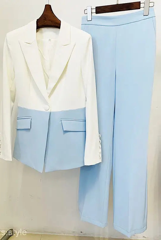 Two-tone women’s blazer suit set with white blue stitching and light blue trousers
