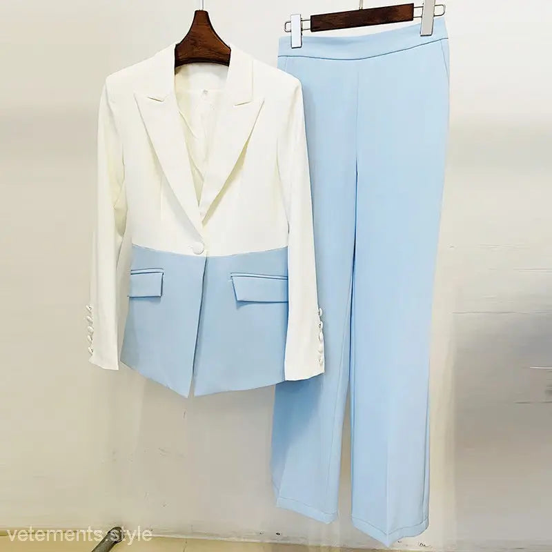 Two-tone women’s blazer suit set with white blue stitching and light blue trousers