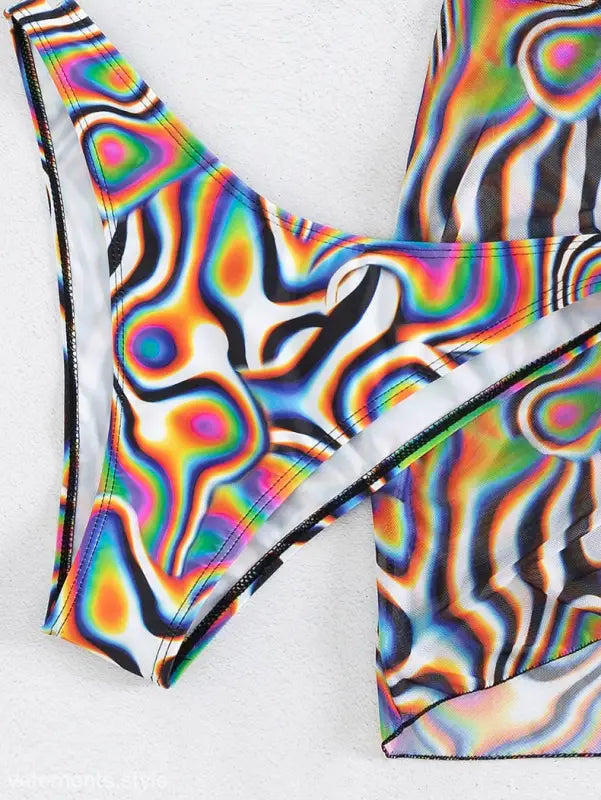 Colorful bikini three piece set with psychedelic swirl print high-waisted bottom and mesh cover-up
