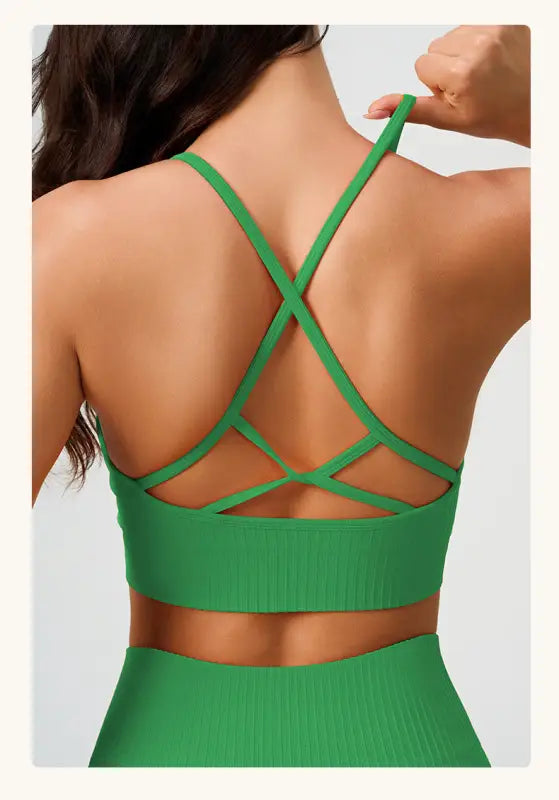 Green ribbed sports bra with crisscross straps for Comfy High Waist Yoga Shorts in Peach Blossom Pink and Dark Coffee Color