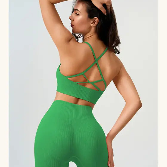 Woman in green ribbed workout set showcasing Comfy High Waist Yoga Shorts in Peach Blossom Pink and Dark Coffee Color