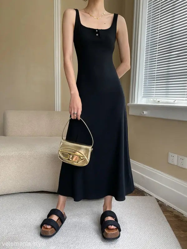 Long black slim dress with square neckline and button details in Comfy Outdoor Slim collection