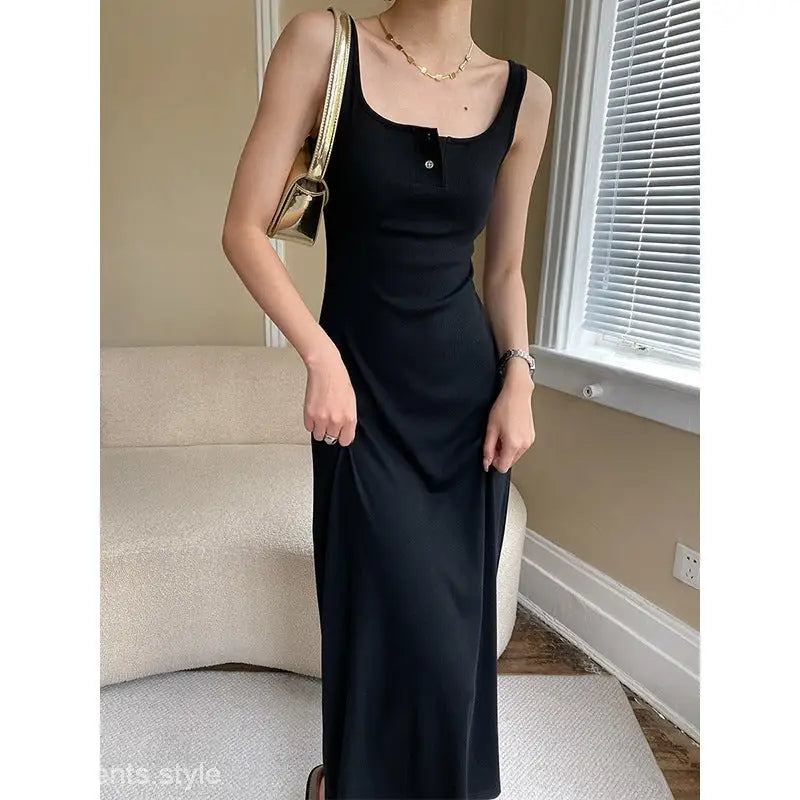 Black sleeveless maxi dress with fitted silhouette from Comfy Outdoor Slim collection