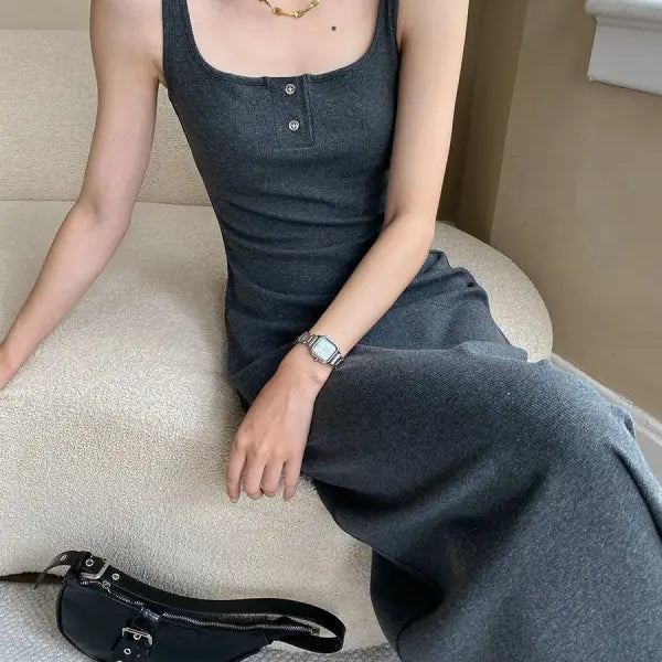 Sleeveless dark gray maxi dress with square neckline and button details, perfect for comfy outdoor slim style