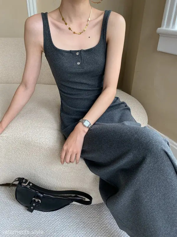 Sleeveless dark gray maxi dress with square neckline and button details, perfect for comfy outdoor slim style